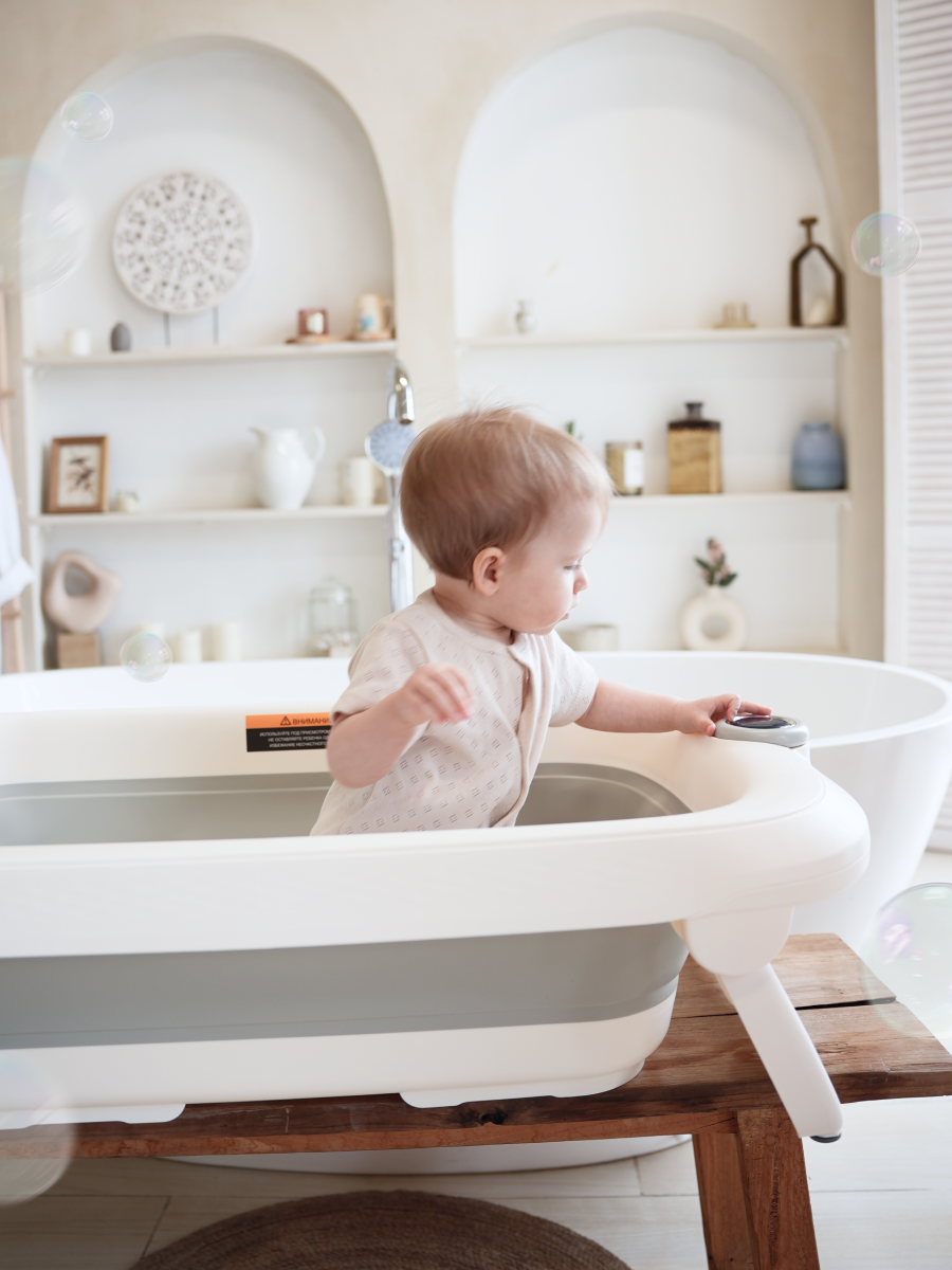 Ванночка для купания новорожденных складная с термометром